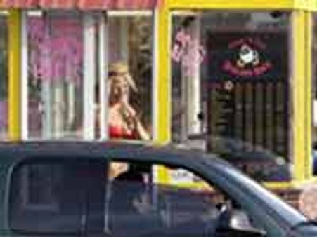 US coffee shops charged with prostitution