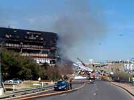 Angry with IRS, man crashes plane into building