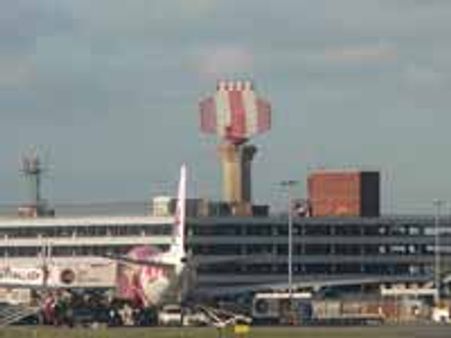 UK airports reopen, scientists fear new volcano