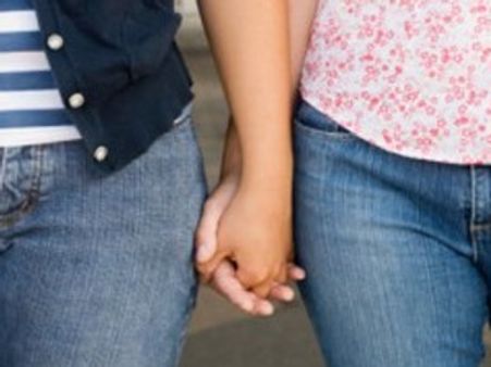 Lesbian couple ties nuptial knot, faces threats