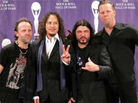 First F1 insult, Metallica organisers arrested for fraud