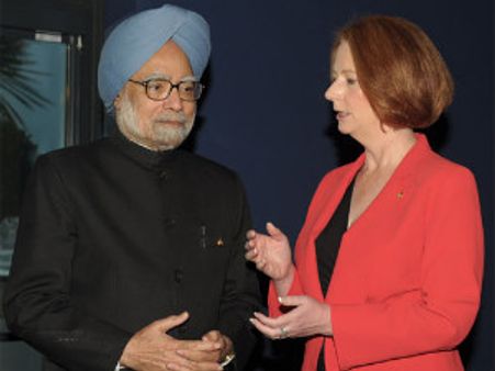 Singh, Gillard meet in Bali; discuss uranium sale issue