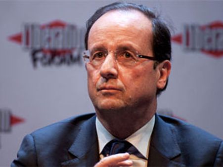 President Hollande unveils moderate new Cabinet
