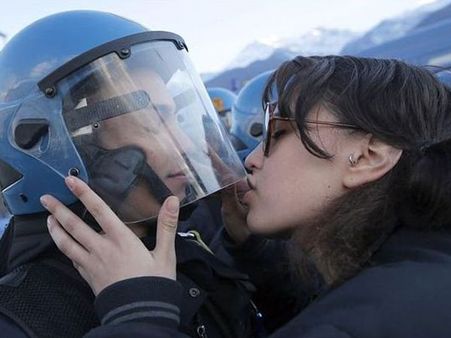 Italy: Woman protester charged for 'sexual assault' for 'kissing' cop