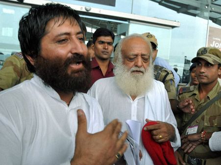 Narayan Sai's female disciple surrenders before police in Surat
