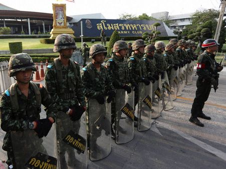 Thai military summons former premier, spells out new agenda
