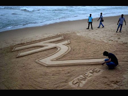 Rupee at near five-month low on dollar demand