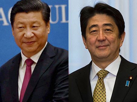 Awkward handshake begins China-Japan relations afresh
