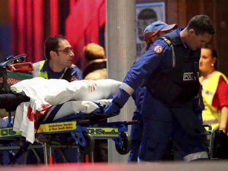 Sydney siege: Dead cafe manager tried to wrestle weapon from gunman to free hostages