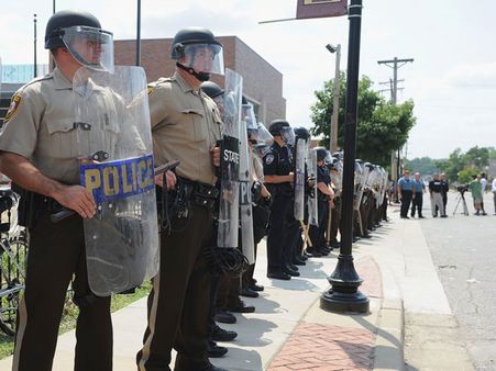 Armed teenager shot dead near Ferguson in US