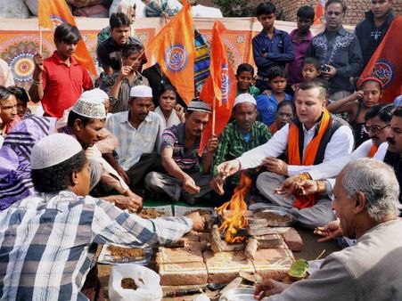 Year 2014 saw controversies over 'love-jihad', 'ghar-wapsi'