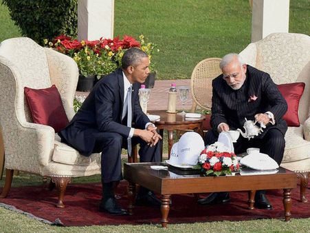 Narendra Modi does a Hosni Mubarak, wears fabric with his name printed on it