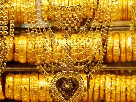 Gold glitters on seasonal demand, global cues, up Rs 230