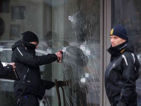 Tens of thousands in Copenhagen vigil for shooting victims