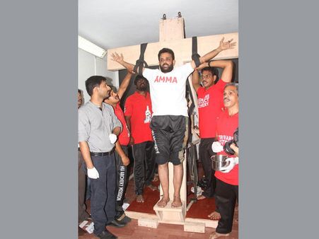 'Hooked' to Amma: Fan gets himself nailed on a cross for her 67th birthday