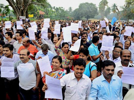 Sweeper stitches a woman patient at OT
