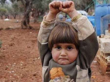 Syrian girl surrenders: Child recognises a gun but not a camera