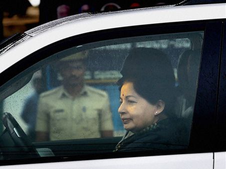 Yoga expert walks on hands over joy of relasing Jayalalithaa