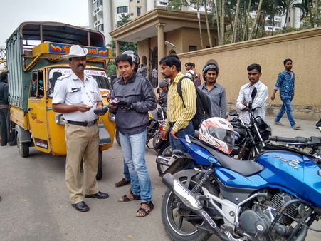 Bengaluru: Special drive by RTO officials for Helmet rule; 500 pillion riders booked