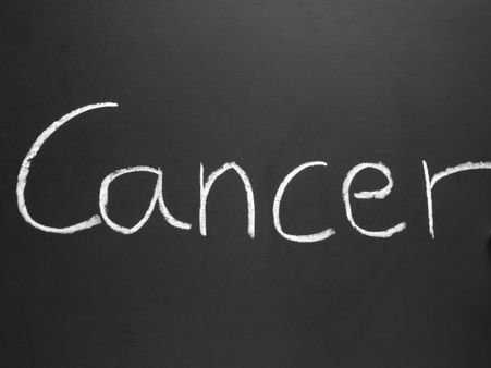 How do breast cancer cells spread?