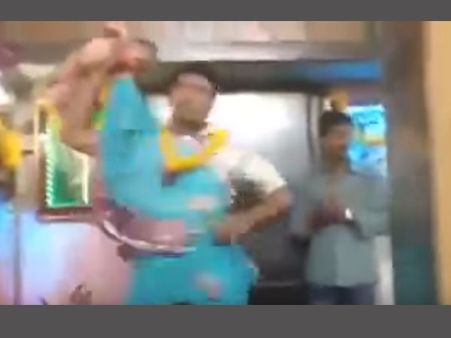 Jaw-dropping video: Godman dances and swings a baby with full energy!