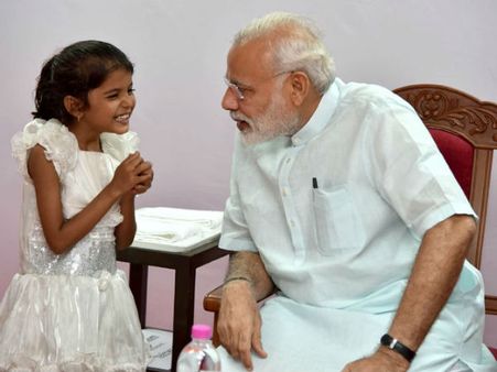PM meets girl who had sought help for heart surgery in Pune