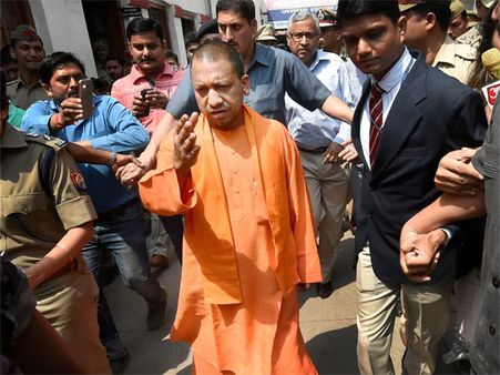Yogi in action: Calls on two-time rape victim, orders strict action