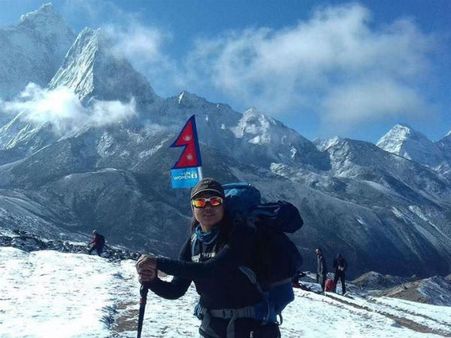 Nepali woman scales Mt Everest with message against human trafficking