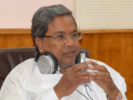 CM Siddaramaiah watches Baahubali 2, draws flak