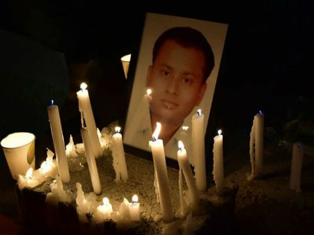 Friends of IAS Anurag Tiwari takes out candle march, demands CBI probe