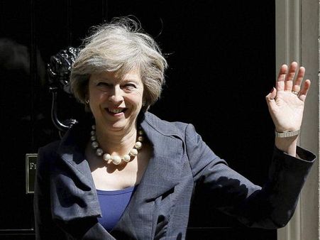 Theresa May arrives at Buckingham Palace for meeting with queen