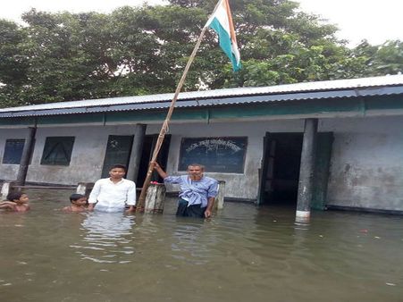 Praising flag hoisting in submerged school is not enough. Flood-hit Assam needs help