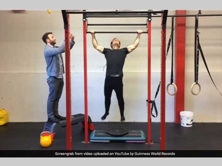 Fitness enthusiast sets Guinness World Record for most pull-ups in a minute