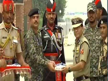 It’s a ‘sweet’ affair at Wagah-Attari border as violence takes a backseat