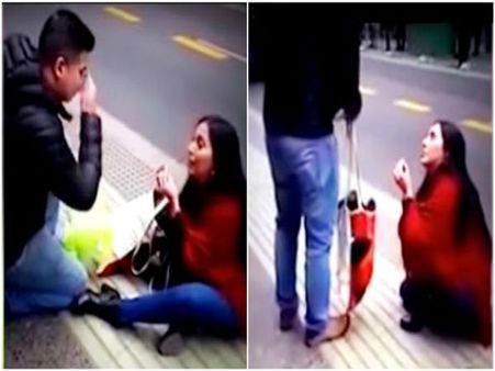 Woman's public proposal goes horribly wrong as she sits alone on the street