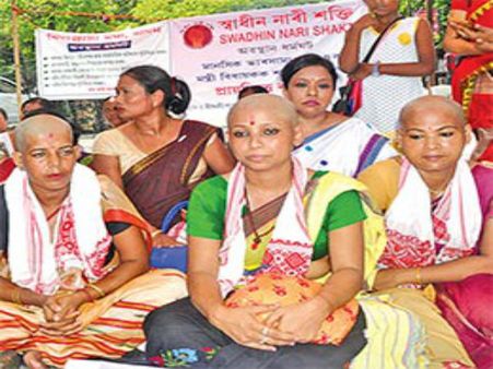 ‘Bald, beautiful’ women of Assam tonsure their heads to protest against BJP