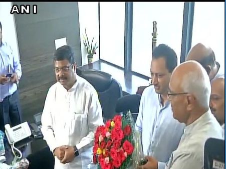 Cabinet reshuffle: Pradhan, Rathore take charge of their new ministries