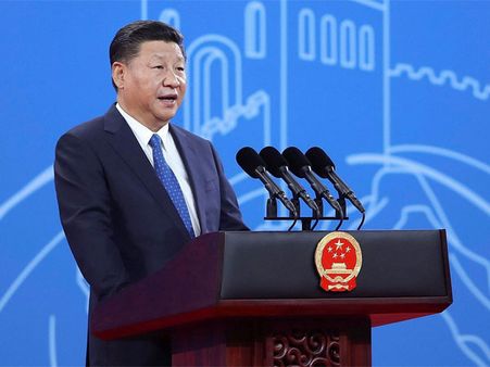 Xi Jinping named in Chinese constitution, elevated to status of Mao, Deng