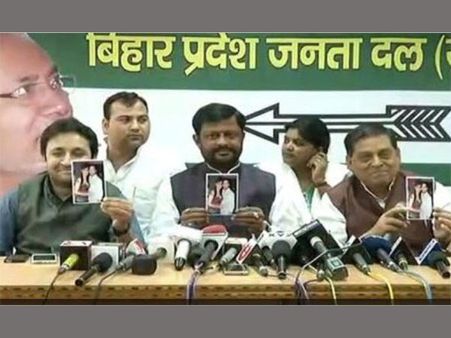 Bihar photo war: JD(U) releases picture of Tejaswi with girl and beer bottle
