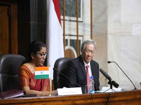 With eye on China, India and Singapore vow to boost defence ties