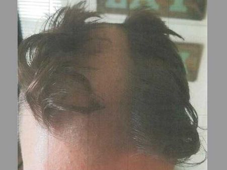 Bizzare! Barber arrested for giving nasty haircut, snipping ear