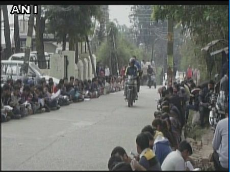 HP: Students sit, read books on road to protest against lack of basic facilities in library