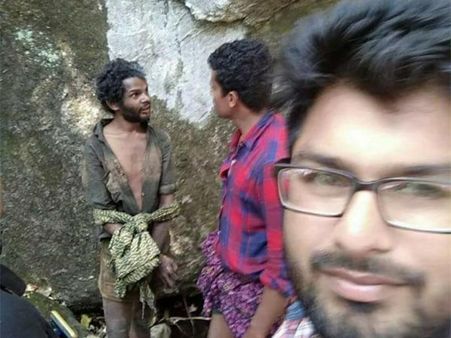 Man takes selfie as adivasi man is beaten to death for stealing food in Kerala
