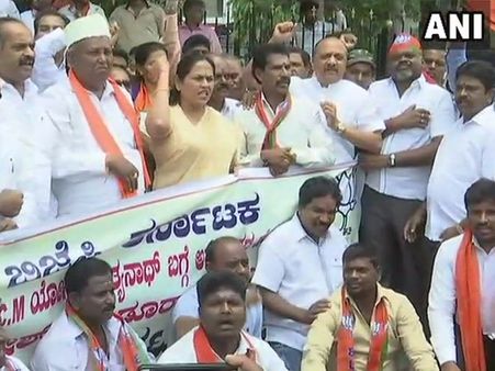 BJP stages protest against Gundu Rao's '<i>Dhongi</i>' remark on Yogi