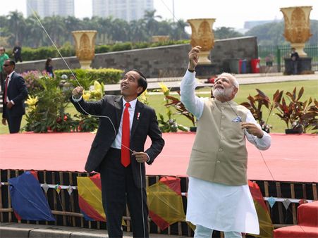 Modi in Indonesia: 15 pacts inked; Modi, Widodo display cultural connect through kite-flying