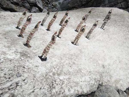 Men in uniform embrace International Yoga Day with great fervour