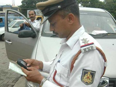 Auto driver charged Rs 700 for not wearing helmet
