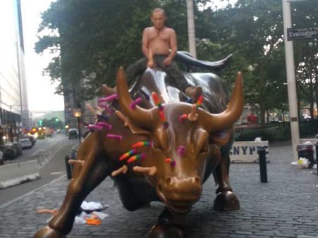 As US resents Trump, ‘Vladimir Putin’ rides NY Charging Bull with sex toys stuck all over it