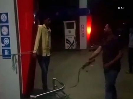 Video of a MP petrol pump owner thrashing his employee with a whip goes viral