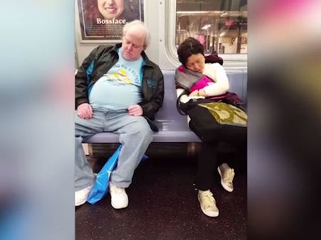Is there something invisible that is pulling these 2 sleeping passengers to each other?